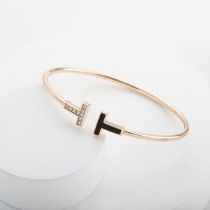 Tiffany & Co. Rose Gold Open Bangle with Black Enamel and Crystal 'T' Ends